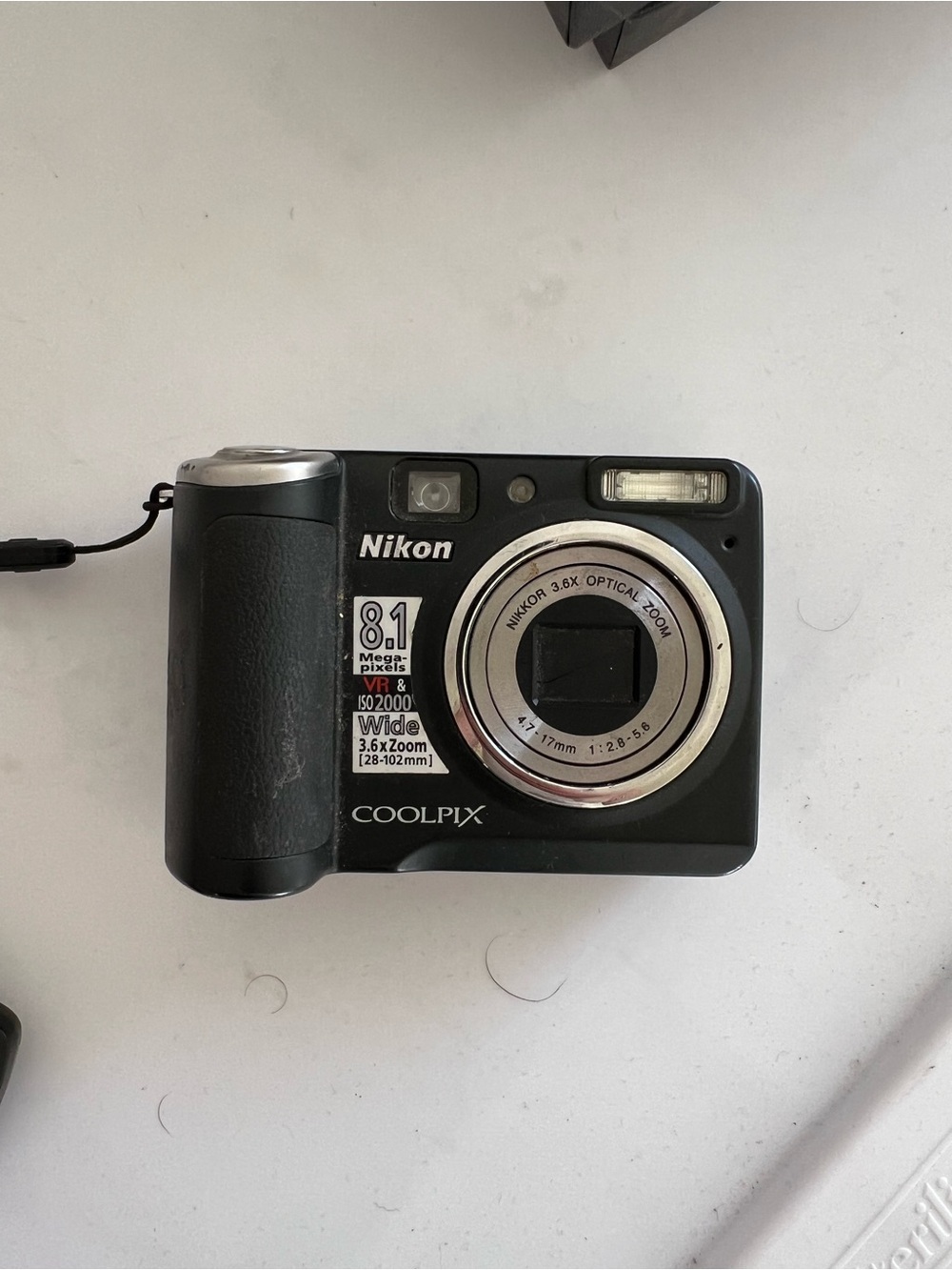 Nikon COOLPIX Compact Digital Camera in Black with Silver Lens Ring
